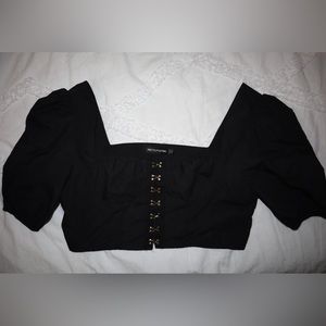 Pretty little things Black clasped puffy sleeve crop top